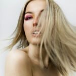 topless woman with blonde hair